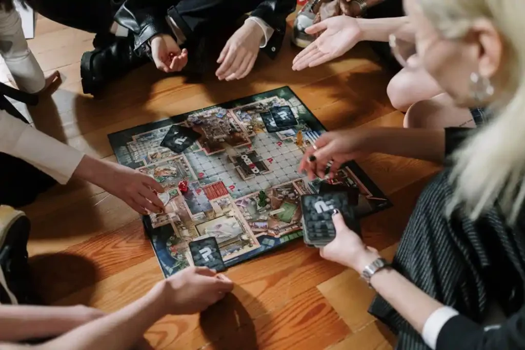 people playing board game